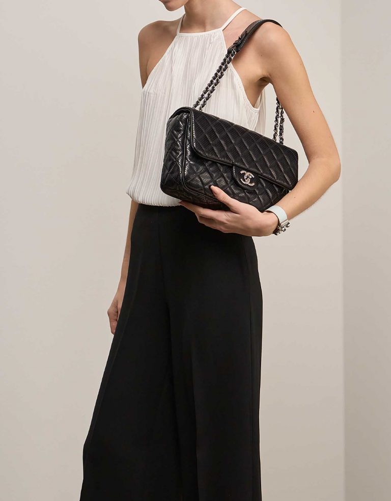 Chanel Timeless Jumbo Black on Model | Sell your designer bag on Saclab.com