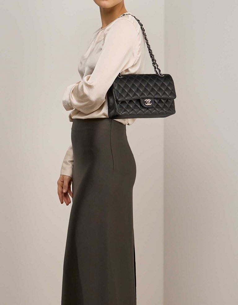 Chanel Timeless Medium Black on Model | Sell your designer bag on Saclab.com