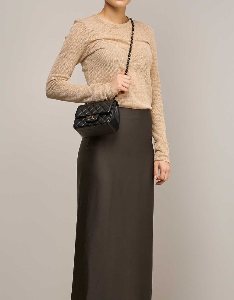 Chanel Timeless Mini Square Lamb Black on Model | Sell your designer bag