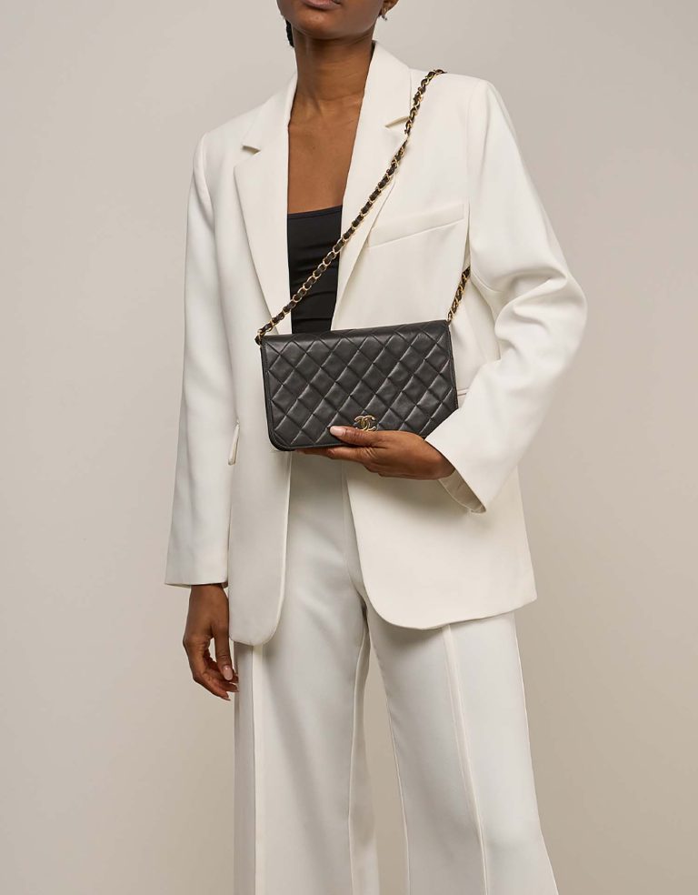 Chanel Timeless Medium Lamb Black on Model | Sell your designer bag