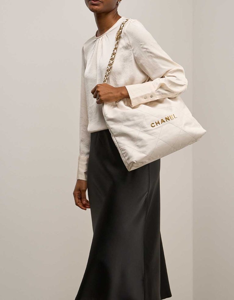 Chanel 22 Medium Lamb Off White on Model | Sell your designer bag