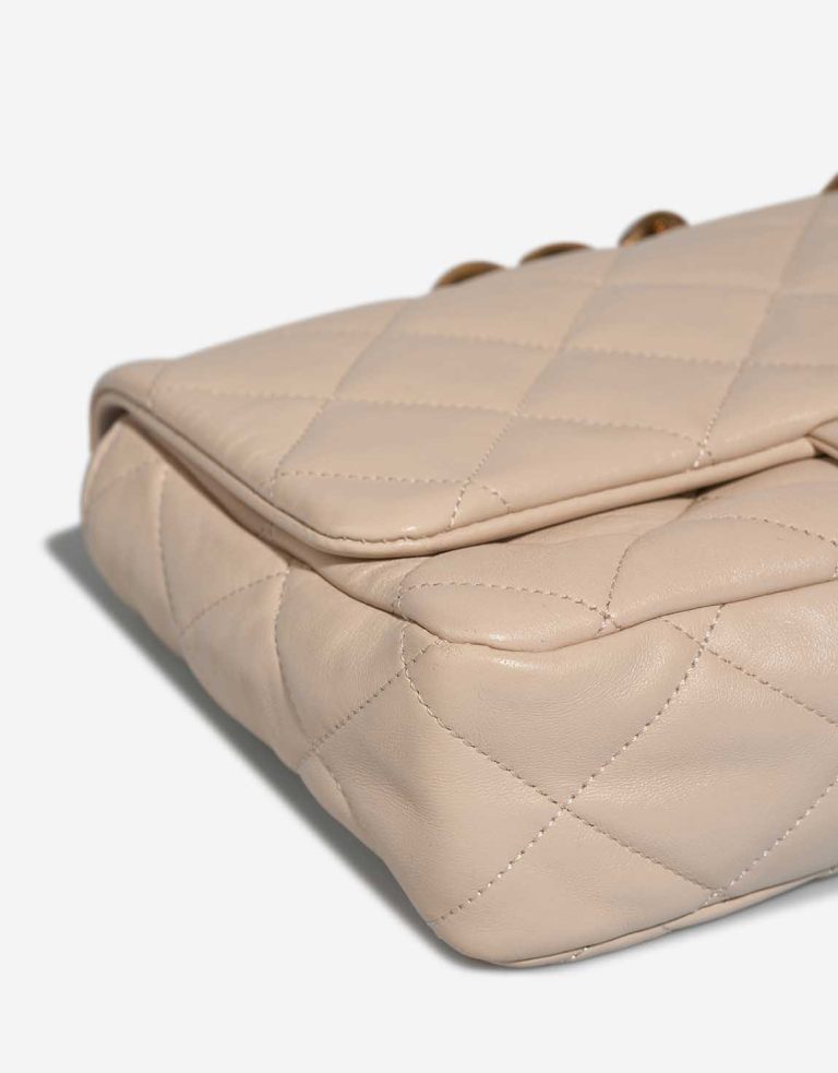 Chanel Flap Bag Medium Lamb Off White Signs of wear | Sell your designer bag