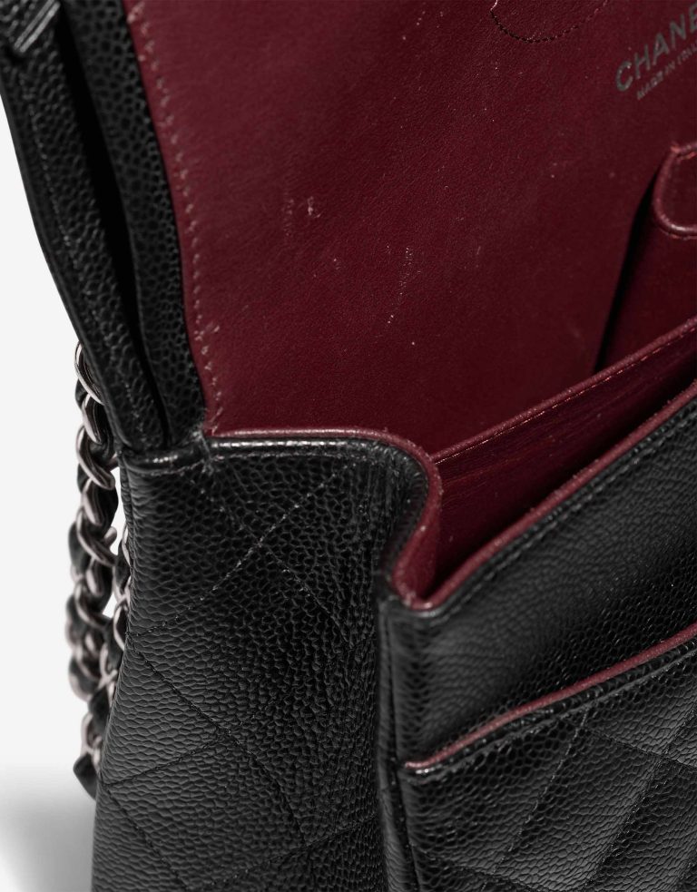 Chanel Timeless Jumbo Caviar Black Signs of wear | Sell your designer bag