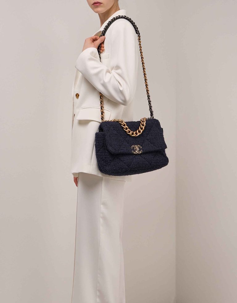 Chanel 19 Flap Bag Tweed / Lamb Dark Blue / Black on Model | Sell your designer bag