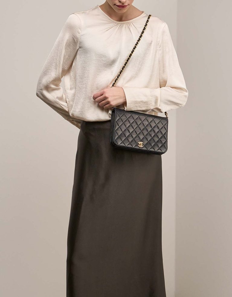 Chanel Timeless Medium Lamb Black on Model | Sell your designer bag