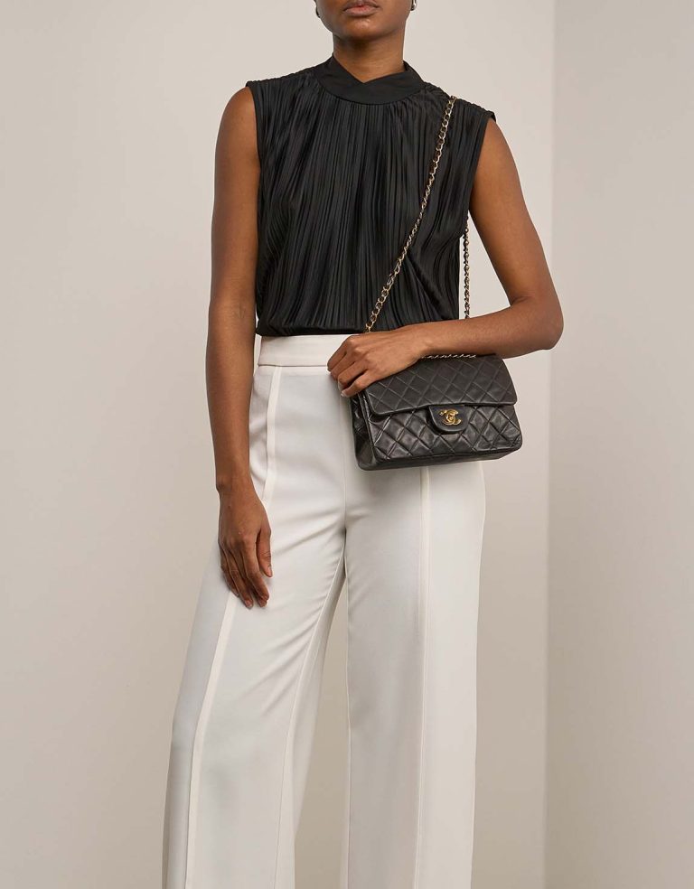 Chanel Timeless Small Lamb Black on Model | Sell your designer bag