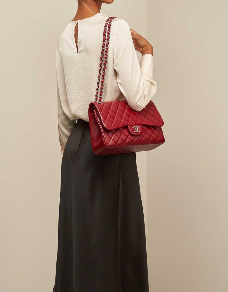 Chanel Timeless Jumbo Caviar Red on Model | Sell your designer bag