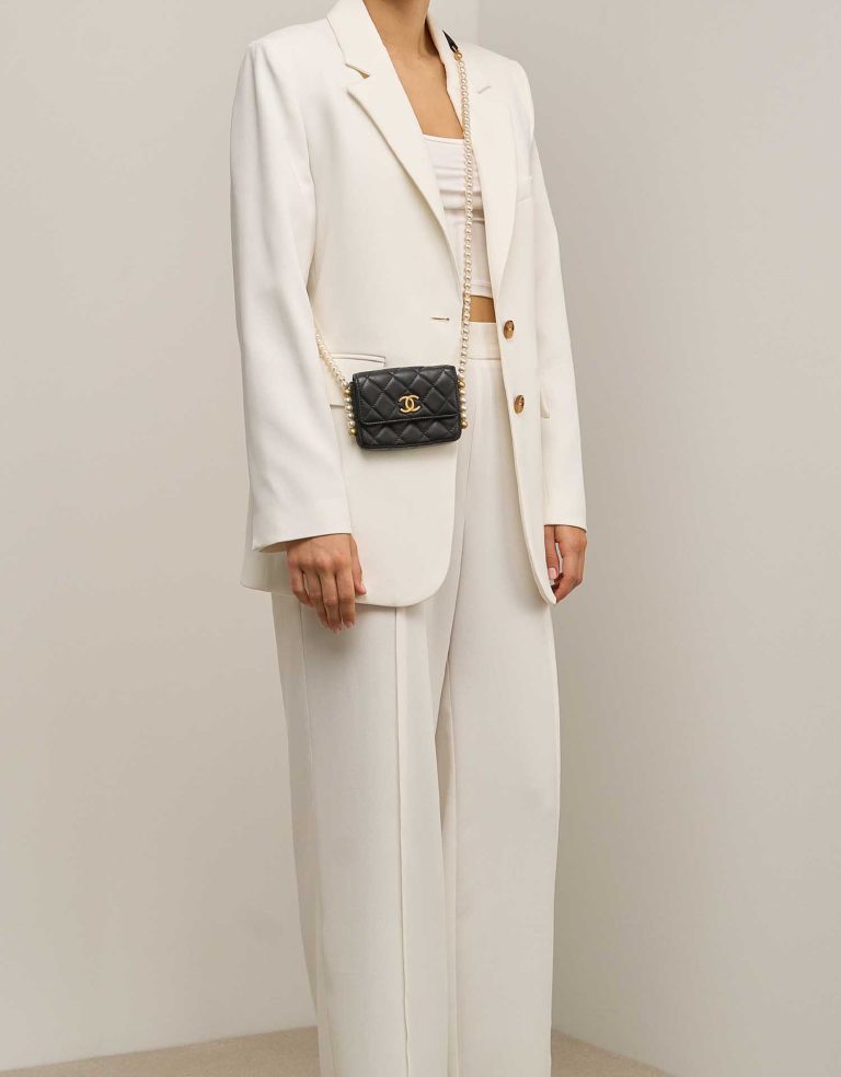 Chanel Timeless Extra Mini Square Lamb Black on Model | Sell your designer bag
