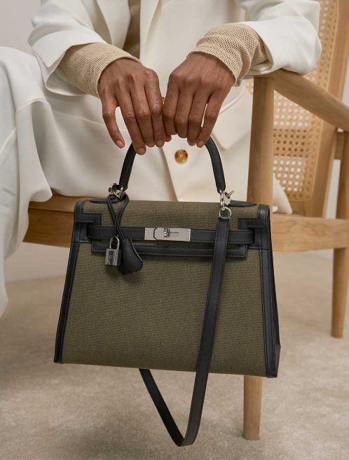 Hermes Kelly 28 Swift / Toile H Black / Vert Militaire  on Model | Sell your designer bag