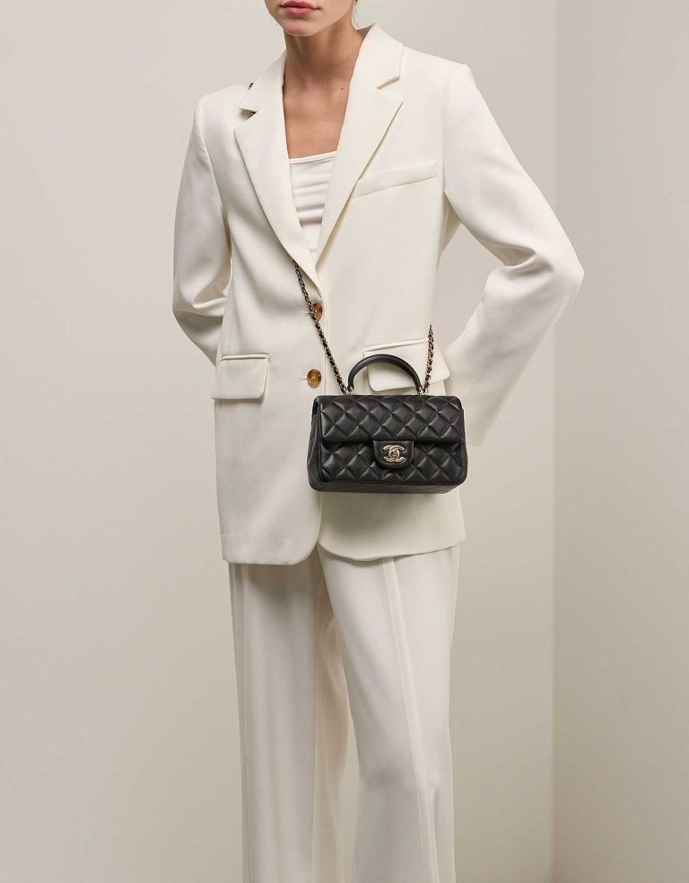 Chanel Timeless Mini Rectangular Lamb Black on Model | Sell your designer bag