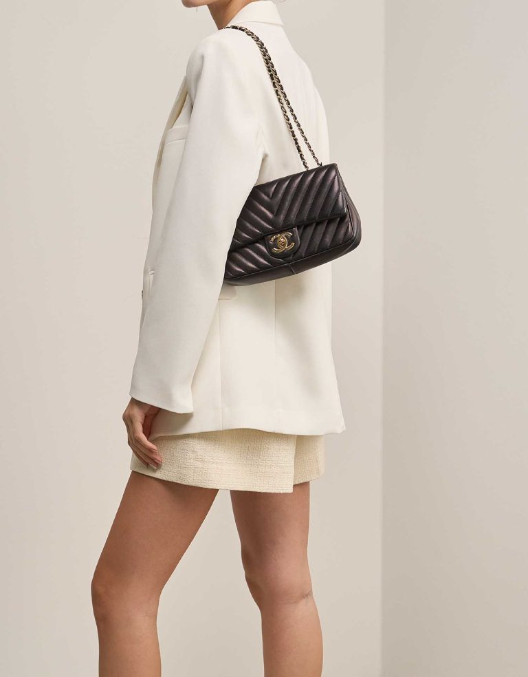 Chanel Timeless Small Lamb Black on Model | Sell your designer bag