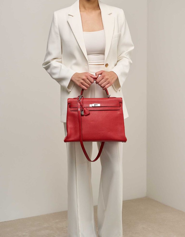 Hermès Kelly 35 Togo Rouge Vif on Model | Sell your designer bag