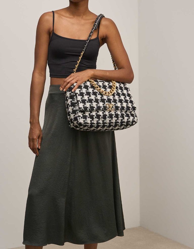 Chanel 19 Maxi Tweed Black / White on Model | Sell your designer bag