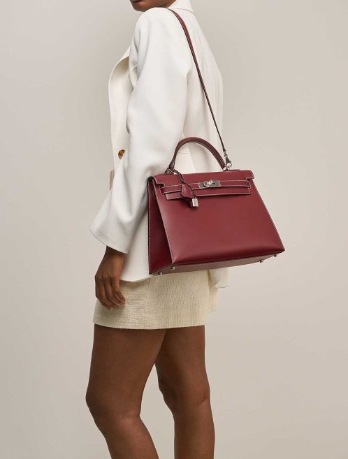 Hermès Kelly 32 Box Rouge H on Model | Sell your designer bag