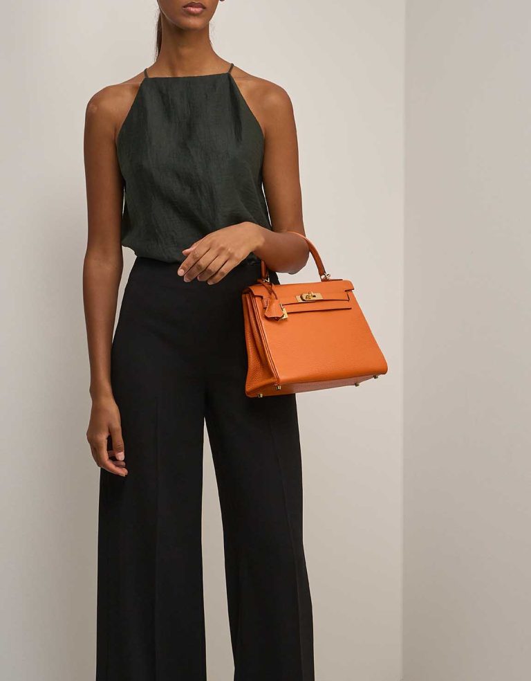Hermès Kelly 28 Clémence Orange H on Model | Sell your designer bag