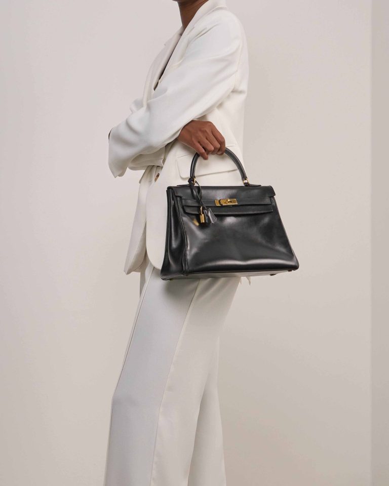 Hermès Kelly 32 Box Black on Model | Sell your designer bag