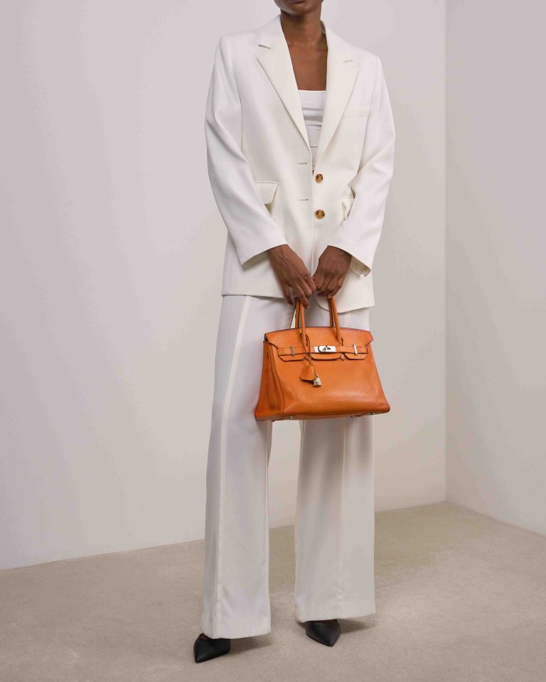 Hermès Birkin 30 Clémence Orange on Model | Sell your designer bag