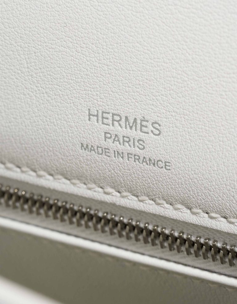 Hermès Kelly 25 Swift / Toile New White / Écru / Beige Logo | Sell your designer bag