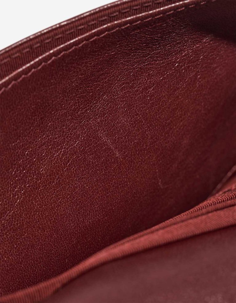Chanel Flap Bag Small Calf Dark Red Signs of wear | Sell your designer bag