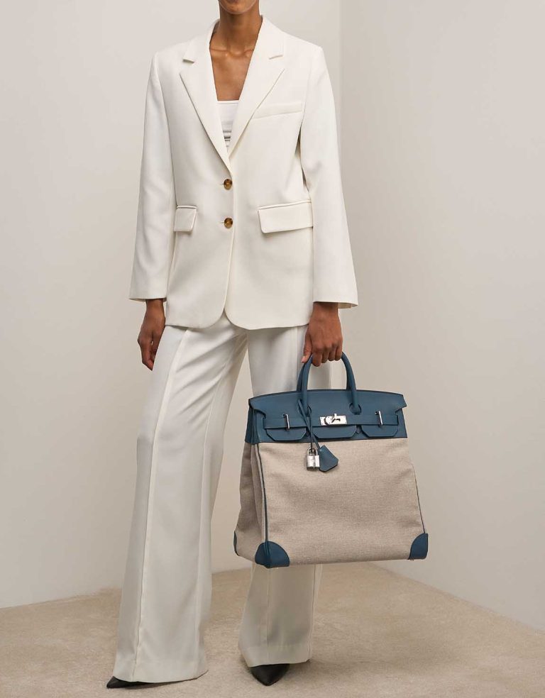 Hermès Haut à Courroies 50 Toile / Veau Evergrain Colvert / Naturel on Model | Sell your designer bag