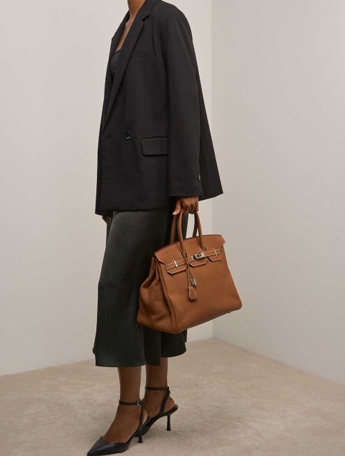 Hermès Birkin 35 Clémence Gold on Model | Sell your designer bag