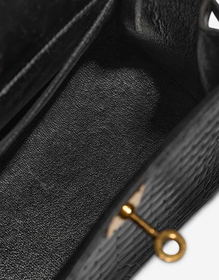 Hermès Kelly Mini Porosus Crocodile Black Signs of wear | Sell your designer bag
