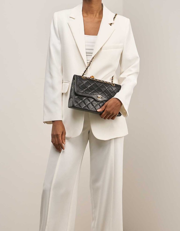 Chanel Timeless Medium Lamb Black on Model | Sell your designer bag