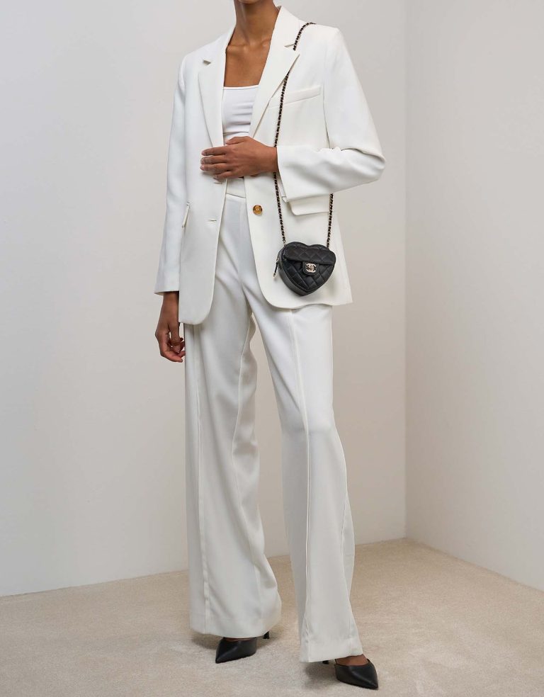 Chanel Timeless Heart Mini Lamb Black on Model | Sell your designer bag