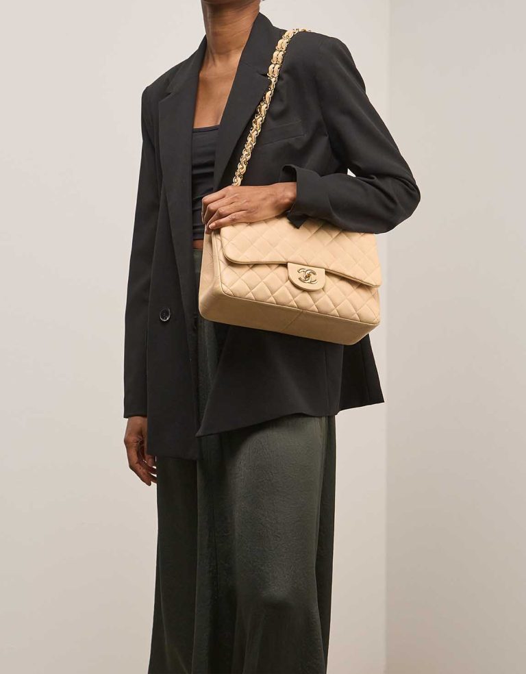 Chanel Timeless Jumbo Lamb Beige on Model | Sell your designer bag