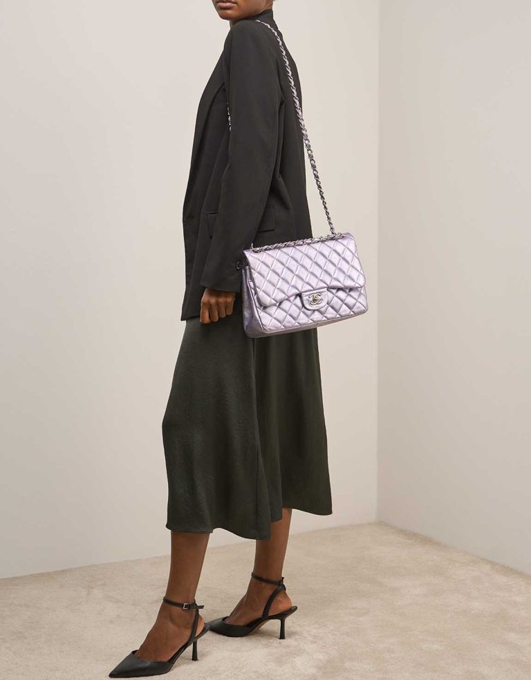 Chanel Timeless Jumbo Lamb Metallic Lilac on Model | Sell your designer bag