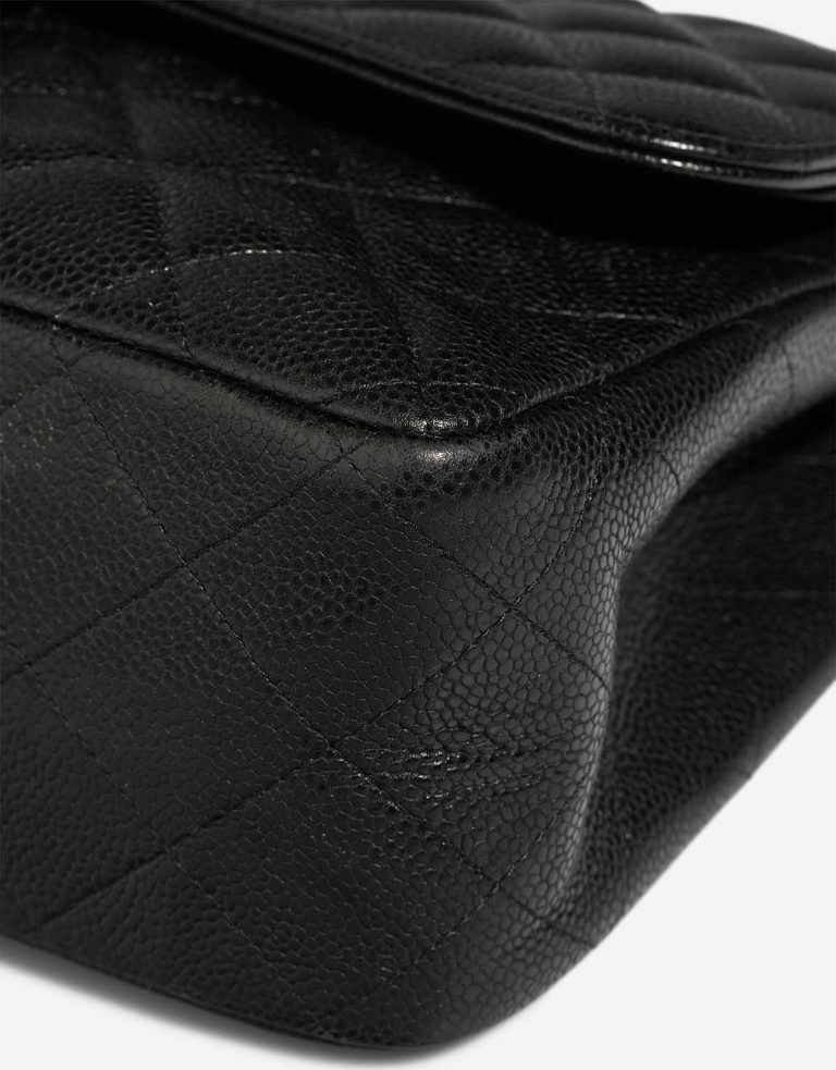 Chanel Timeless Jumbo Caviar Black Signs of wear | Sell your designer bag