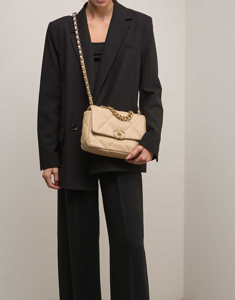 Chanel 19 Flap Bag Calf Beige on Model | Sell your designer bag