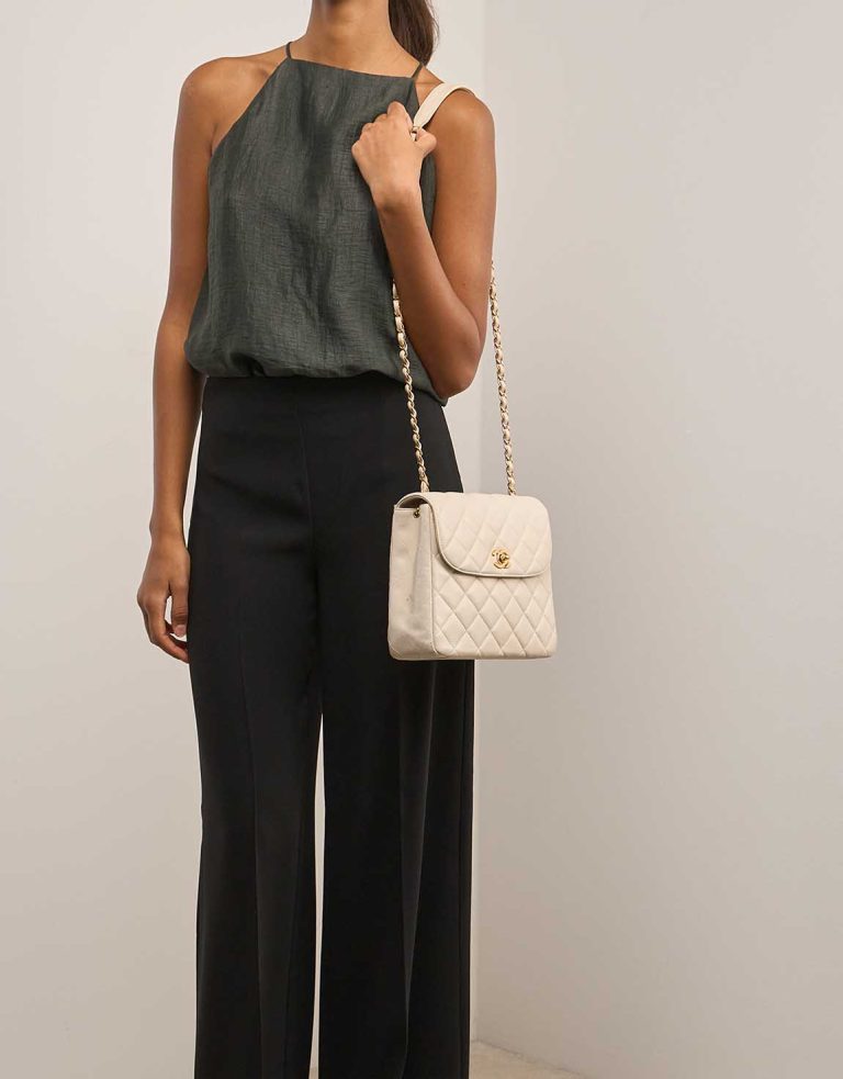 Chanel Flap Bag Medium Lamb Cream on Model | Sell your designer bag