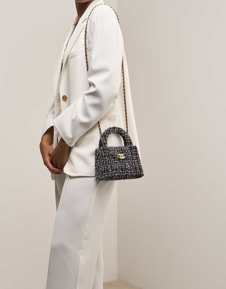 Chanel Kelly Medium Tweed Black / White on Model | Sell your designer bag