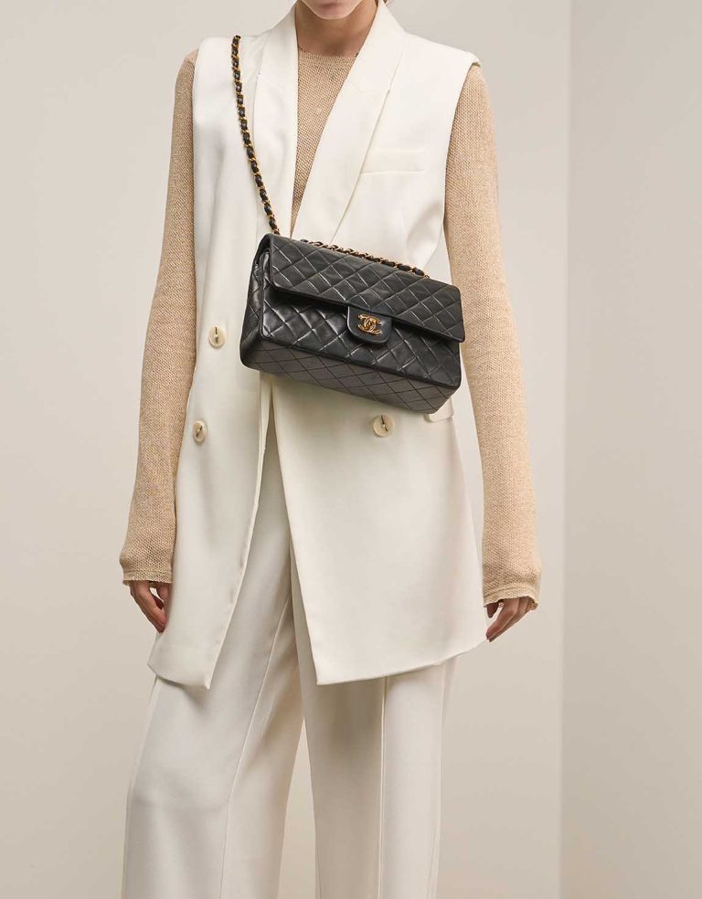 Chanel Timeless Medium Lamb Black on Model | Sell your designer bag