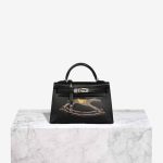 Hermès Kelly Mini Cheval De Bois Tadelakt Black Front | Sell your designer bag