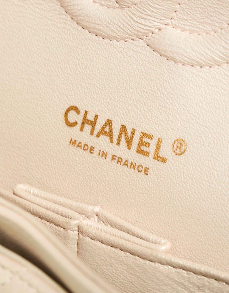 Chanel Timeless Medium Lamb White / Iridescent Logo | Sell your designer bag