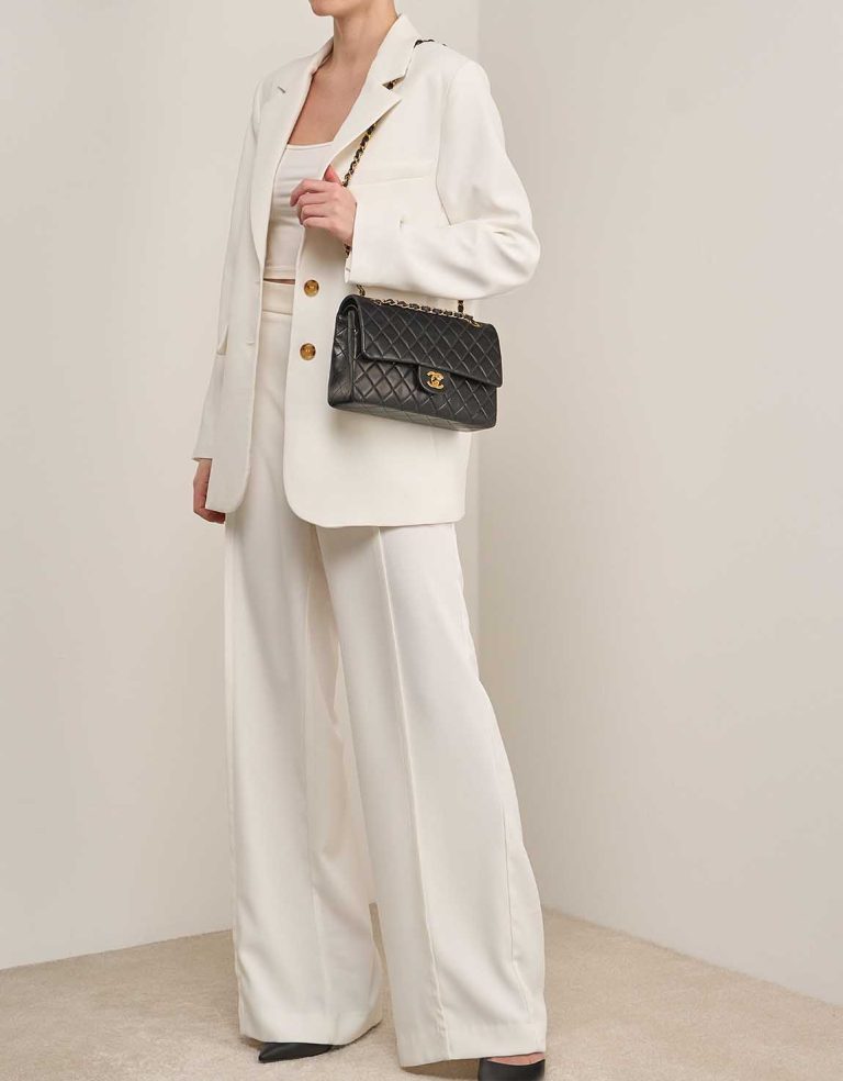 Chanel Timeless Medium Lamb Black on Model | Sell your designer bag