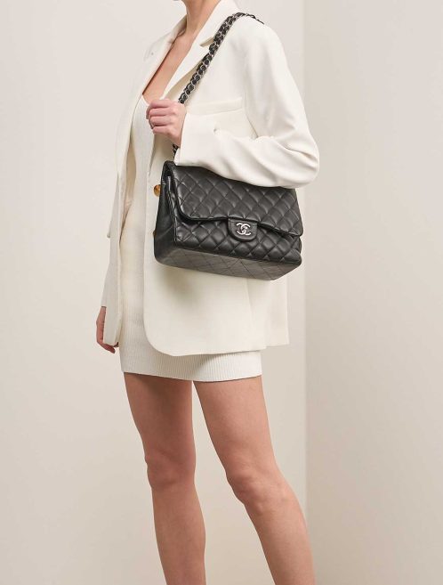 Chanel Timeless Jumbo Lamb Black on Model | Sell your designer bag