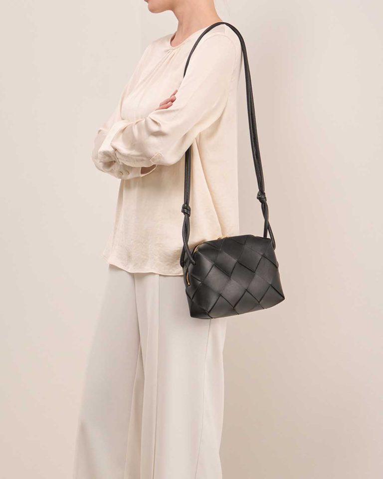 Bottega Veneta Cassette Camera Bag Small Calf Black on Model | Sell your designer bag