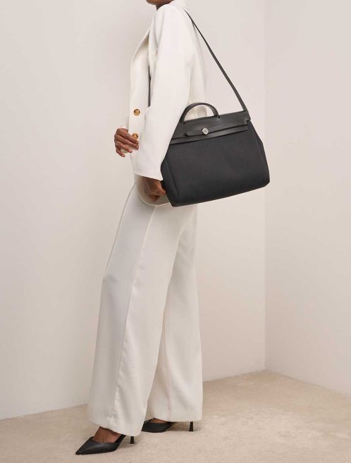 Hermès Herbag 39 Toile / Vache Hunter Noir on Model | Sell your designer bag