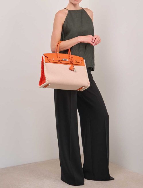 Hermès Birkin Fray 35 Swift / Toile Écru / Orange Poppy on Model | Sell your designer bag