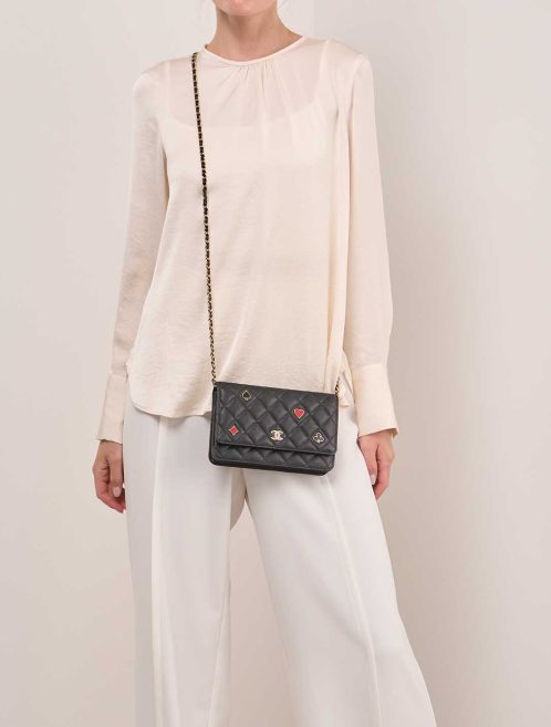 Chanel Timeless Wallet On Chain Caviar Black on Model | Sell your designer bag