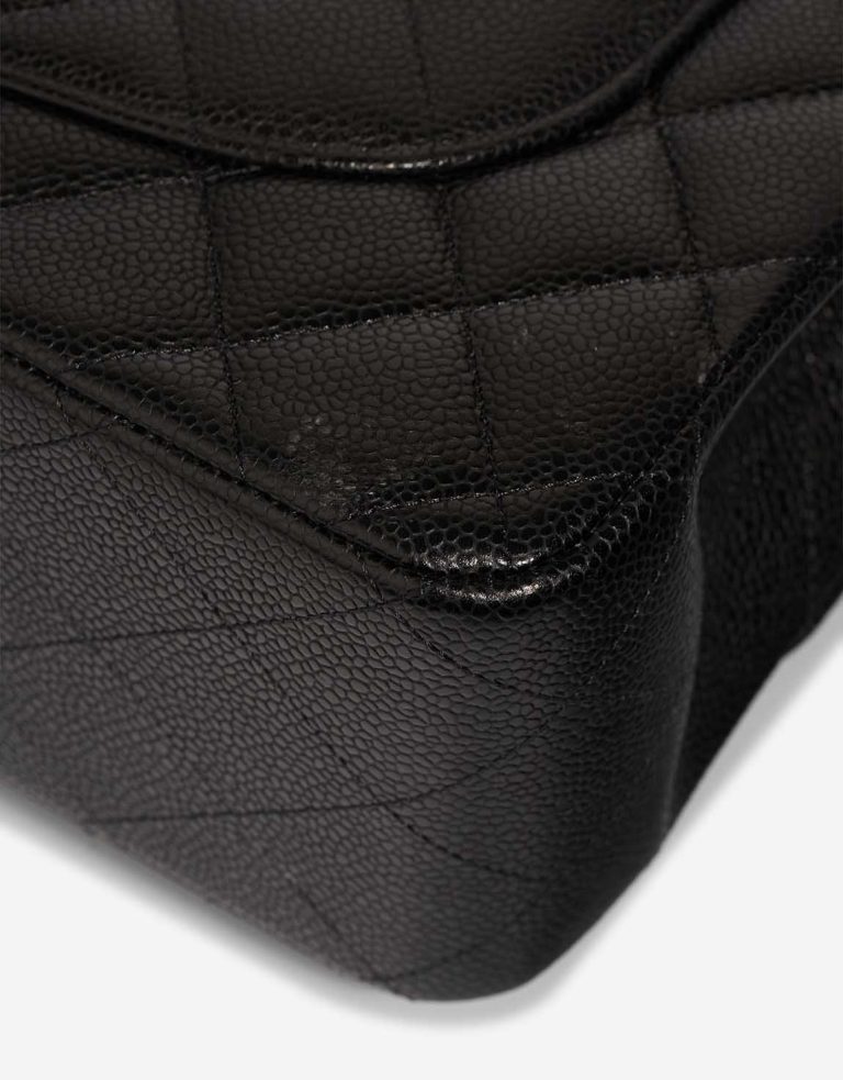 Chanel Timeless Jumbo Caviar Black Signs of wear | Sell your designer bag