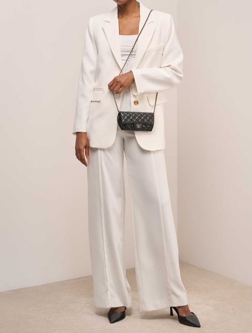 Chanel Timeless Wallet On Chain Lamb Black on Model | Sell your designer bag