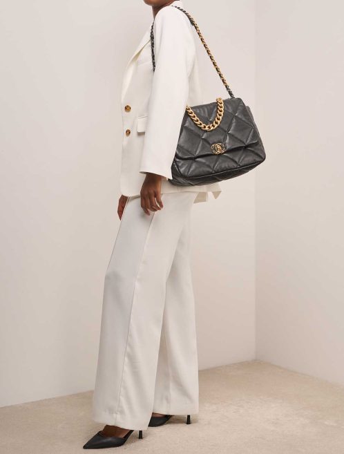 Chanel 19 Large Flap Bag Lamb Black on Model | Sell your designer bag