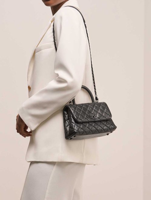 Chanel Timeless Handle Small Crinkled Calf So Black on Model | Sell your designer bag