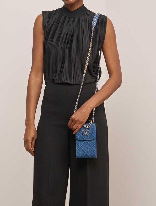 Chanel 19 Phone Holder Denim Blue on Model | Sell your designer bag