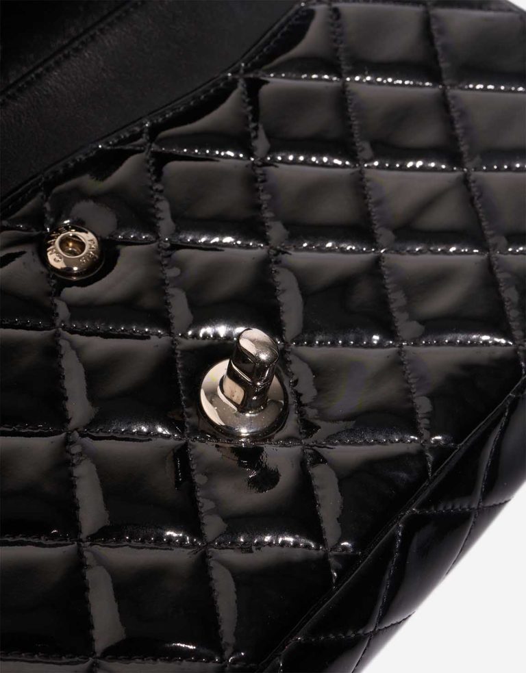 Chanel Timeless Medium Patent Black Signs of wear | Sell your designer bag
