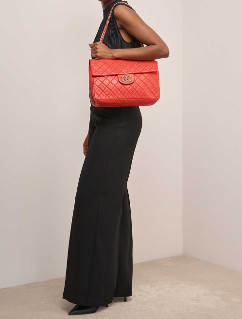 Chanel Timeless Jumbo Lamb Red on Model | Sell your designer bag